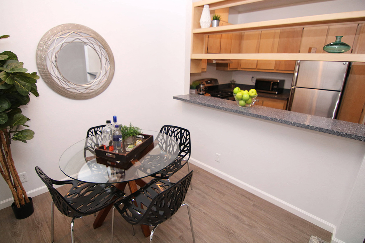 View of dining room and kitchen window